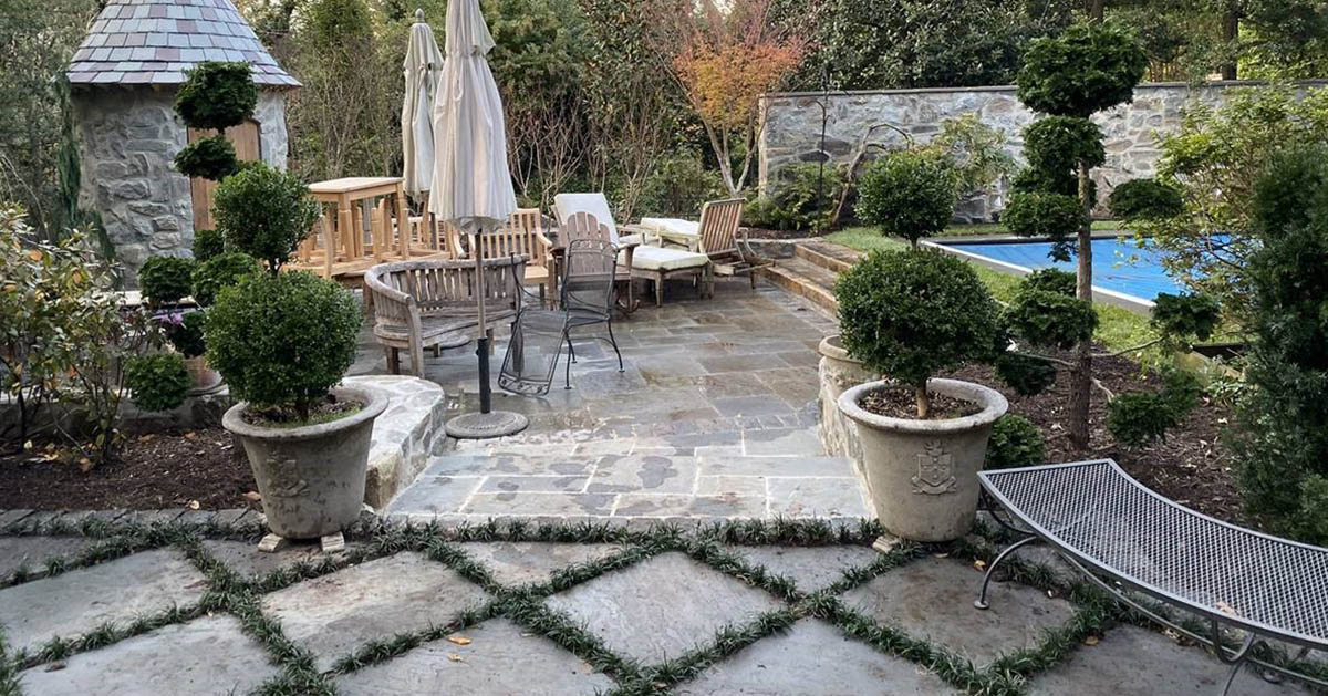 A high-end, dream backyard using antique stone at a private estate in Washington, D.C.