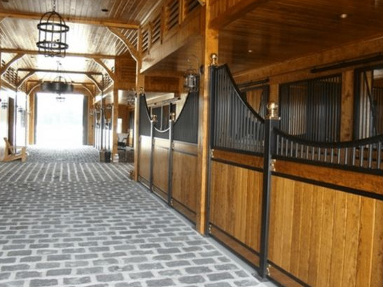 Cobblestone flooring inspired plans for the equestrian training barn
