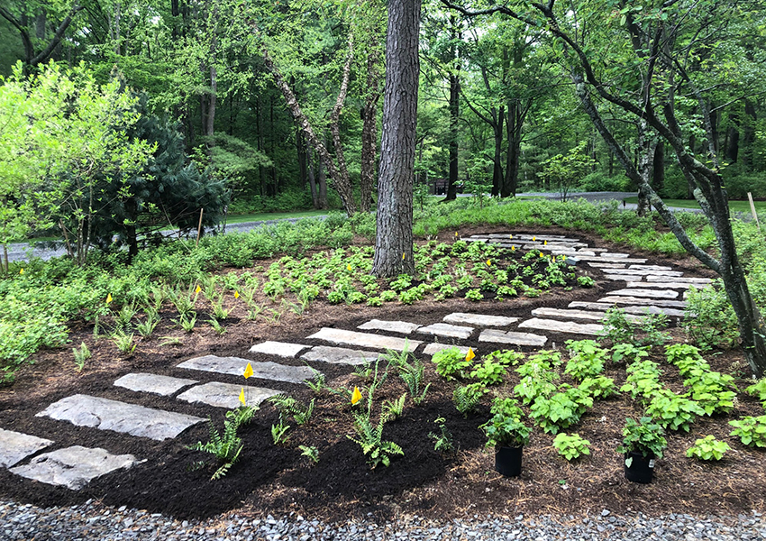 Our reclaimed stone looks beautiful in this landscape improvement project.