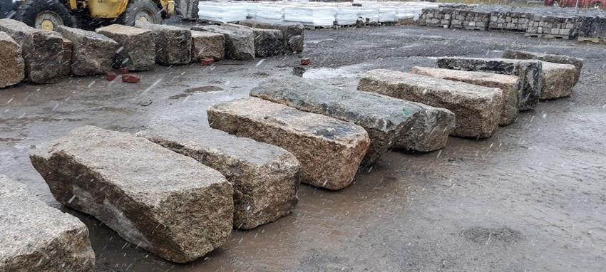 Reclaimed granite large stone blocks set to be measured in production yard
