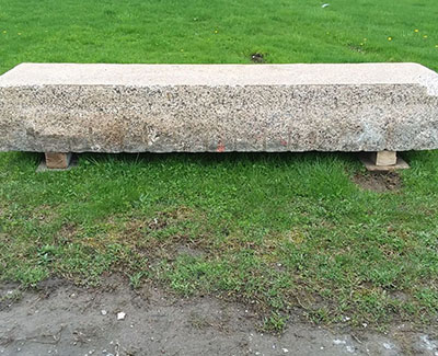 Large stone block creates perfect old rustic benches