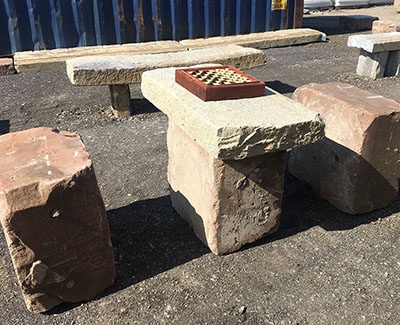 Reclaimed medina sandstone blocks used for table and benches