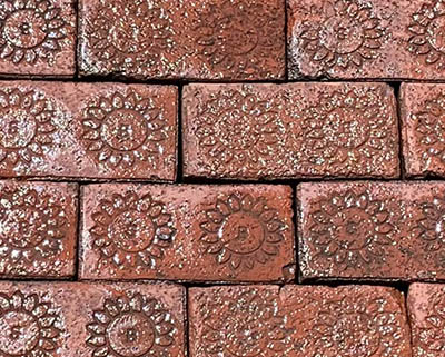 A closer look at the reclaimed sidewalk brick, in a wet application