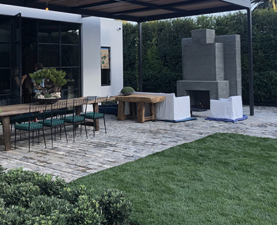 Reclaimed regulation granite cobblestone patio in California