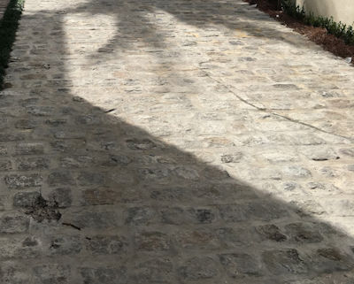 Mortarized installation of stone driveway