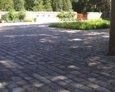 Granite cobblestone driving court at ocean side estate