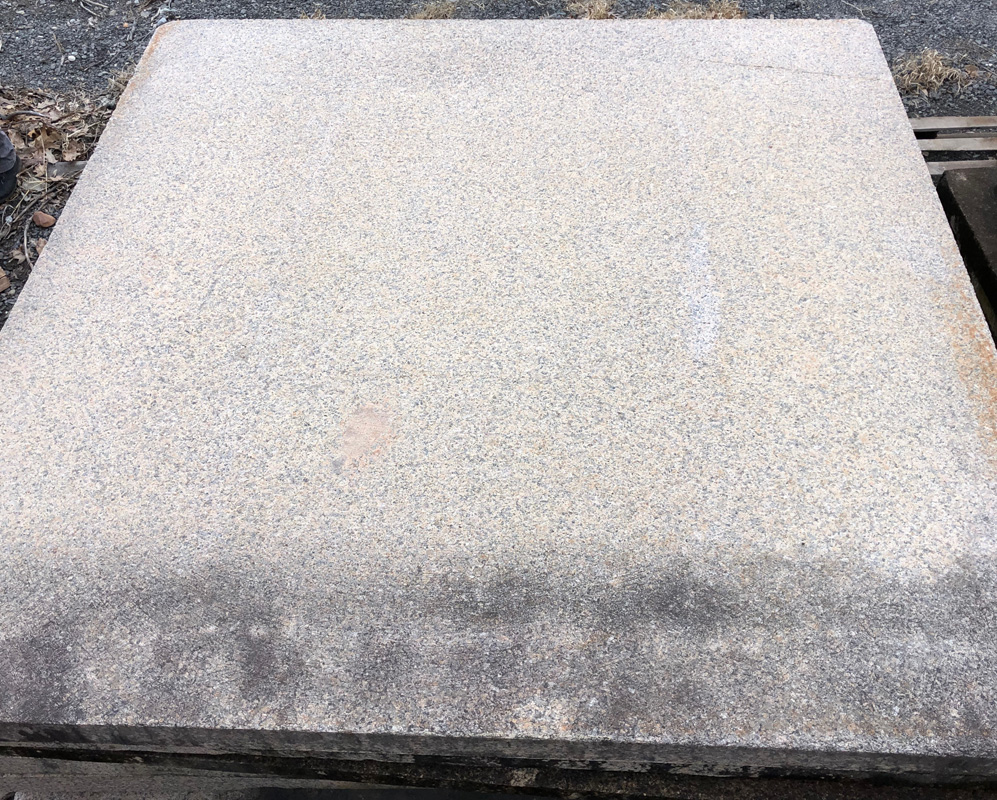 Reclaimed granite stone used as impressive plaza pavers.