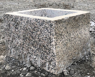 Horse watering trough or dog bowl fabricated from granite stone
