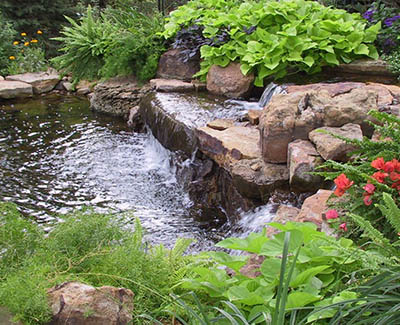 Stone pond waterfall at this cooling oasis for wildlife