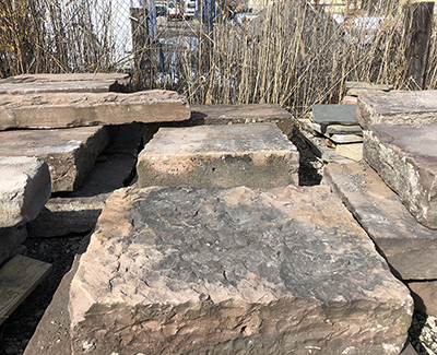 The reclaimed Medina bridge block comes in many different sizes and shapes, as seen in the yard.