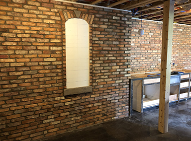 Schoolhouse blend basement project with faux window detail.