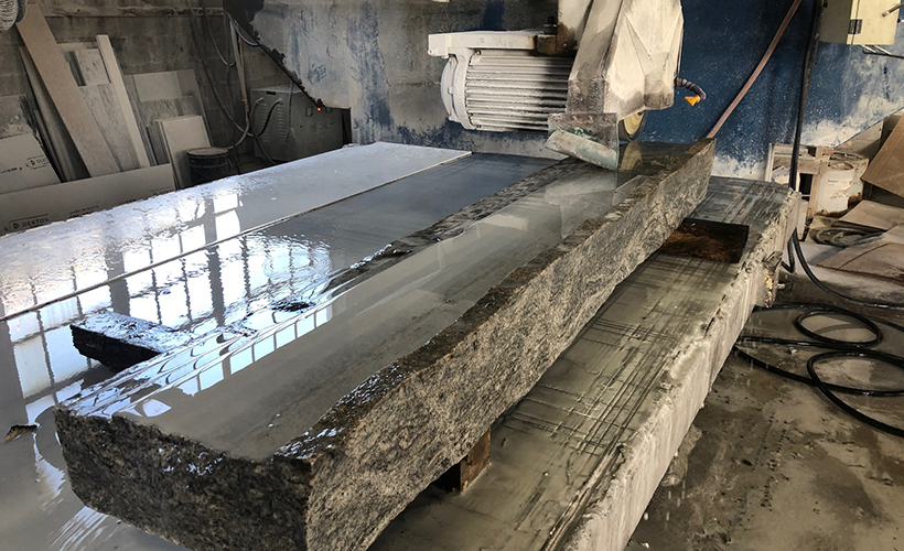 Granite curbing custom fabricated for a fireplace hearth project